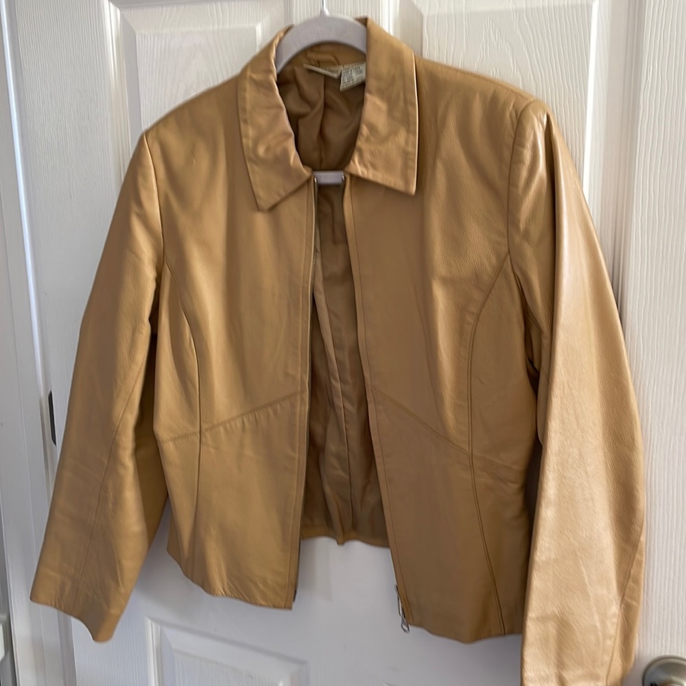 Camel 100% leather jacket. Waist length. Great condition.